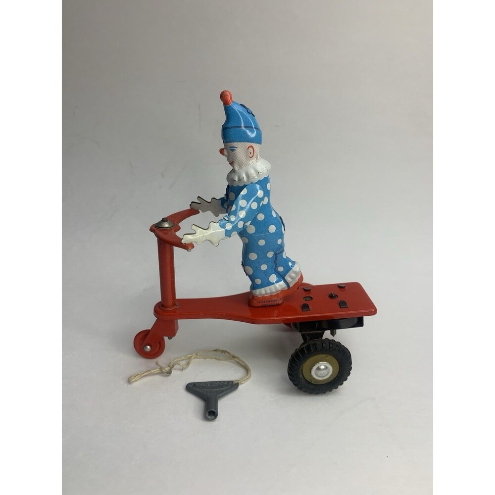 1960's Clown Riding Scooter Tin Wind-Up Toy with Key Lemezarugyar Budapest Work